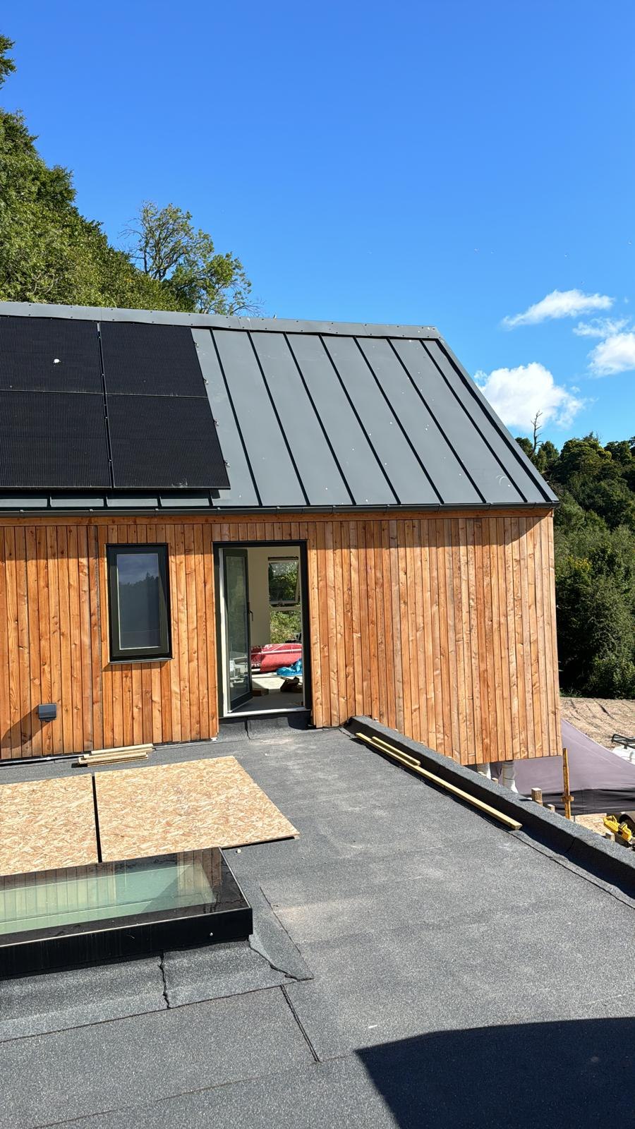 Solar PV installation on a timber-clad new build in the Scottish Borders