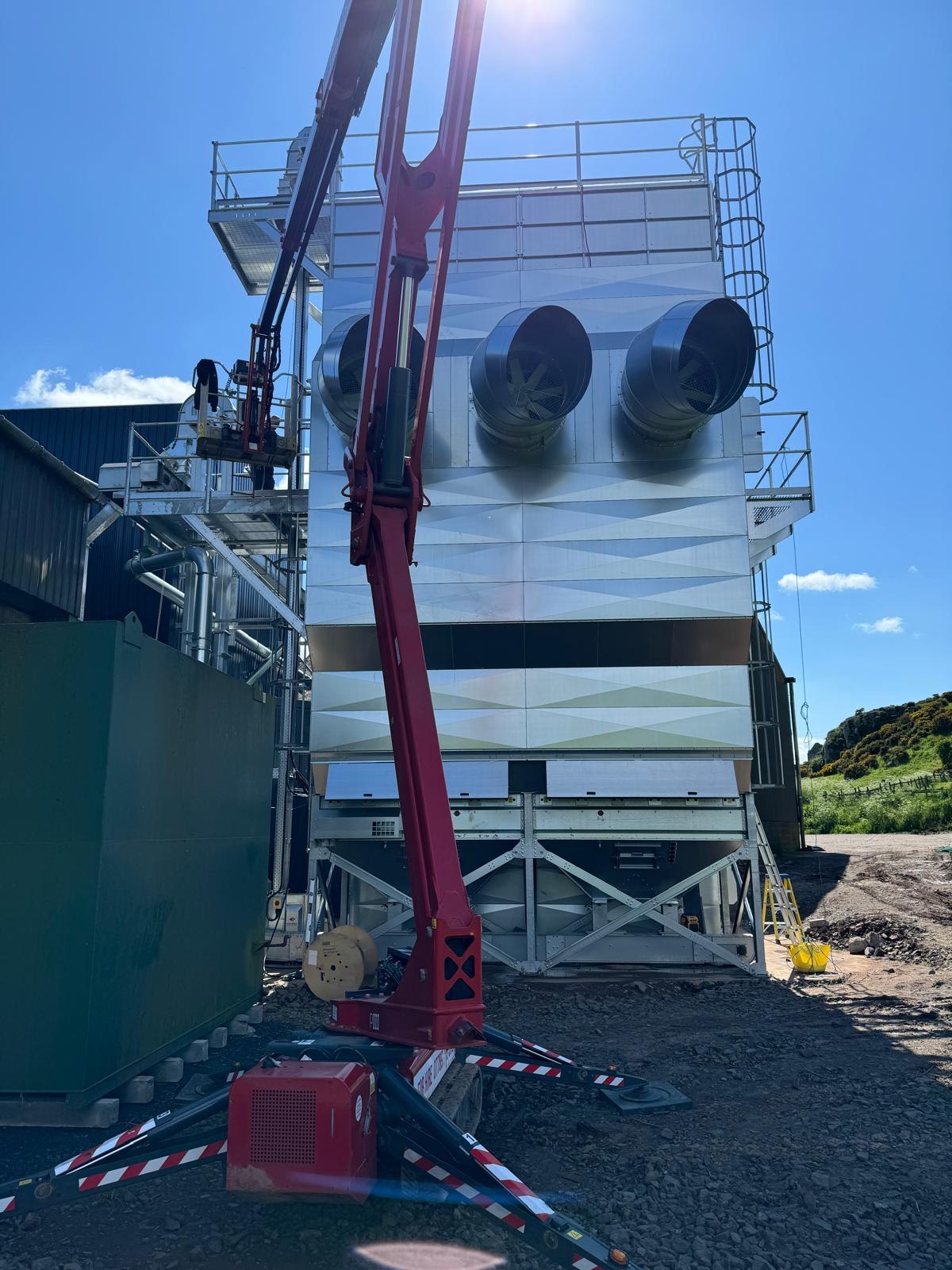Grain drier extraction fan wiring on an agricultural site in the Scottish Borders