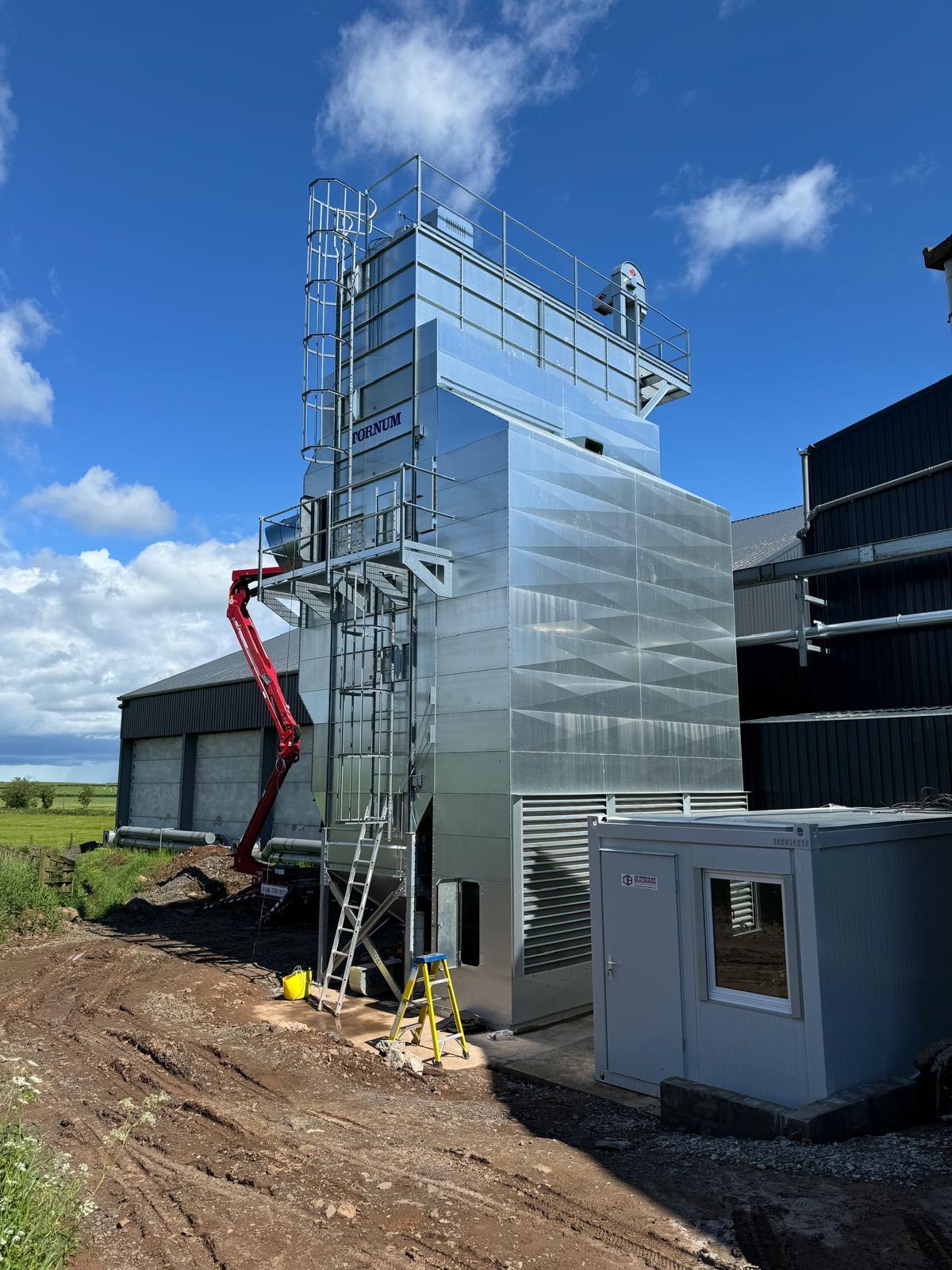 Newly installed grain drier tower wired by agricultural electricians in the Borders